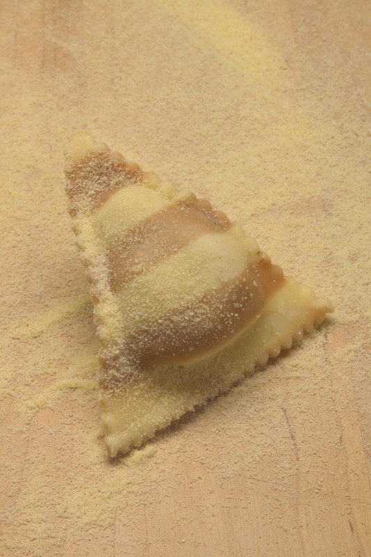 Wild Mushroom wrapped in Porcini and Egg Striped Dough - Triangoli